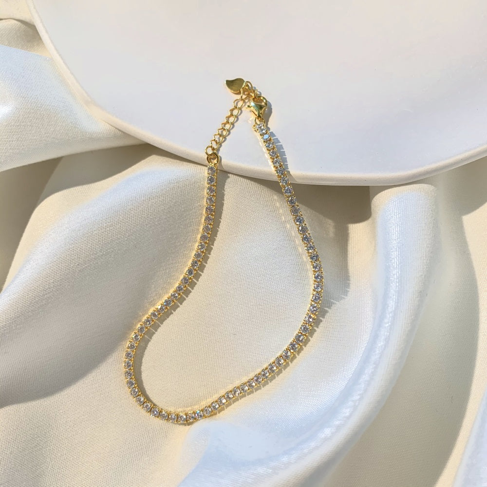 SARINA 2MM ADJUSTABLE TENNIS BRACELET GOLD PLATED